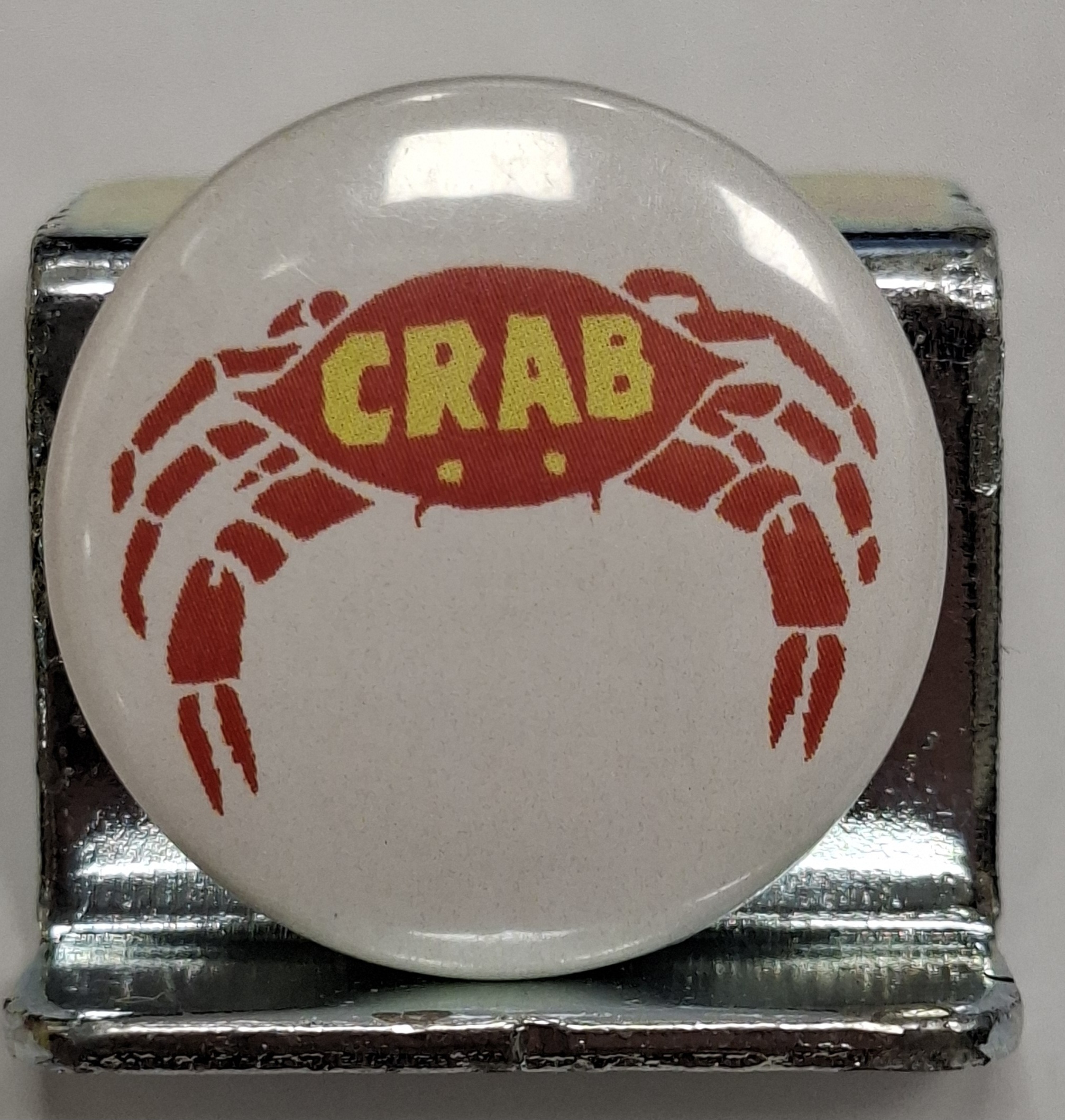 Przypinka. 11. CRAB